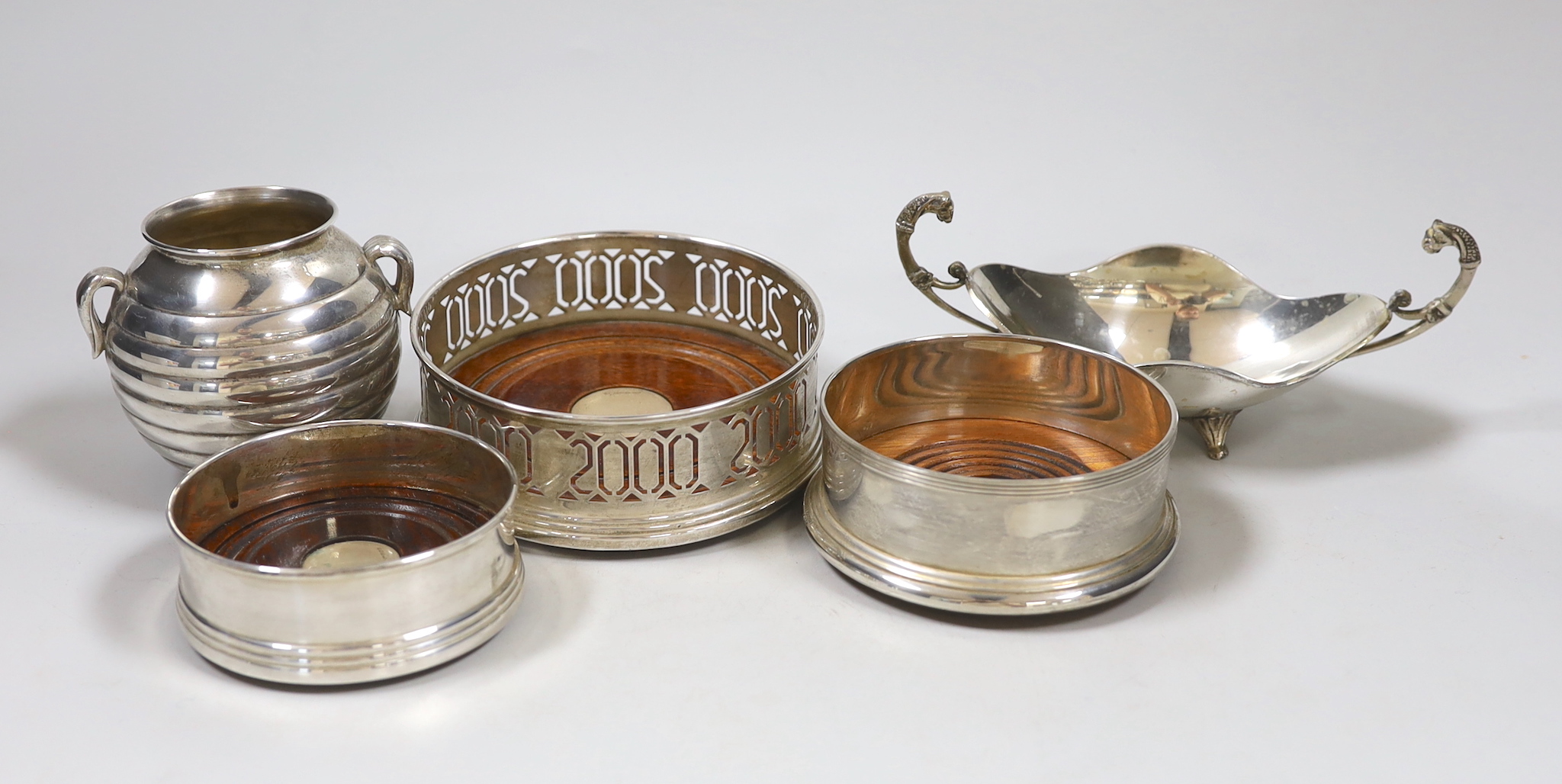 Three modern silver coasters, largest 12.2cm., a modern 925 dish and cup.